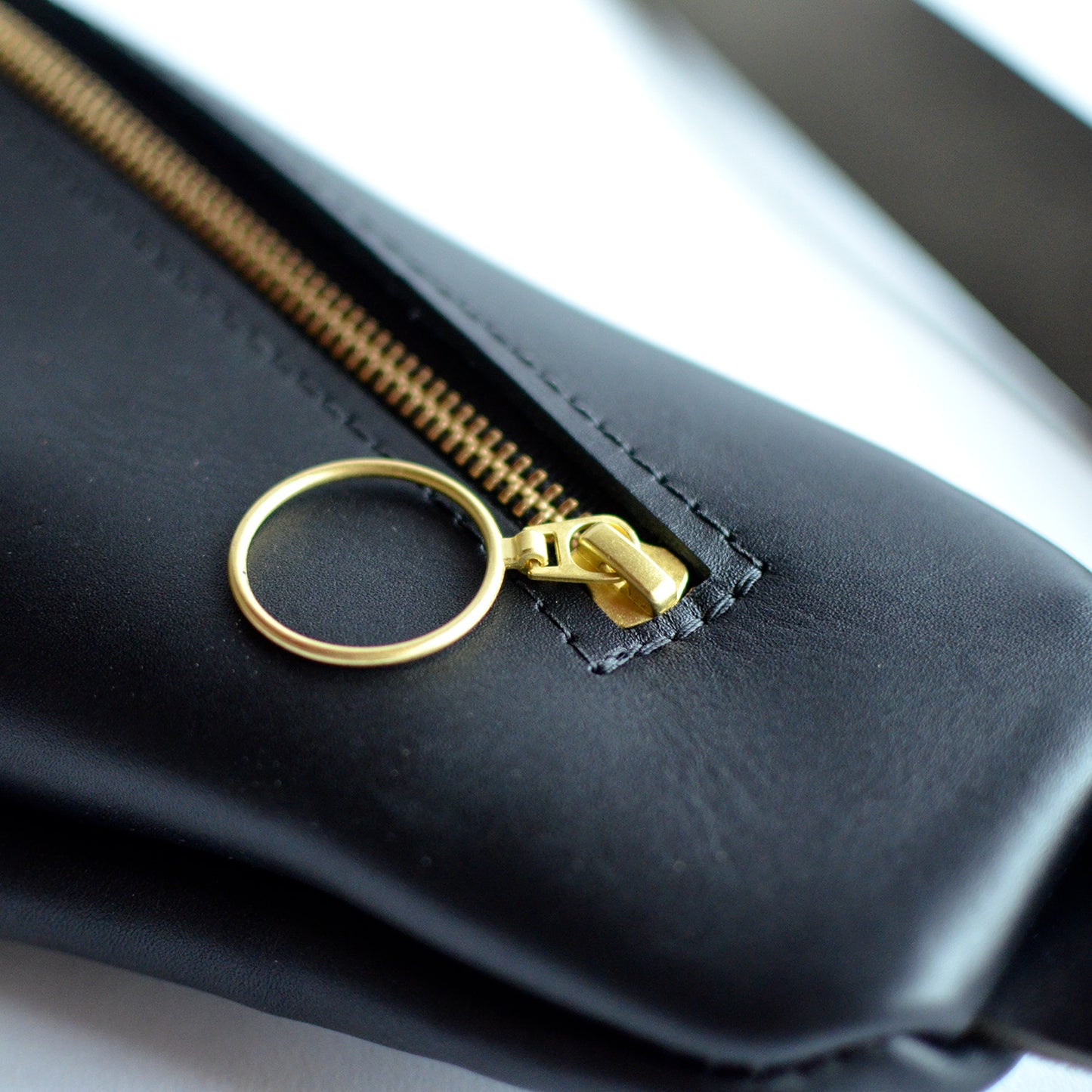 Black Leather + Brass Hardware Sling Bag by Moss Bags